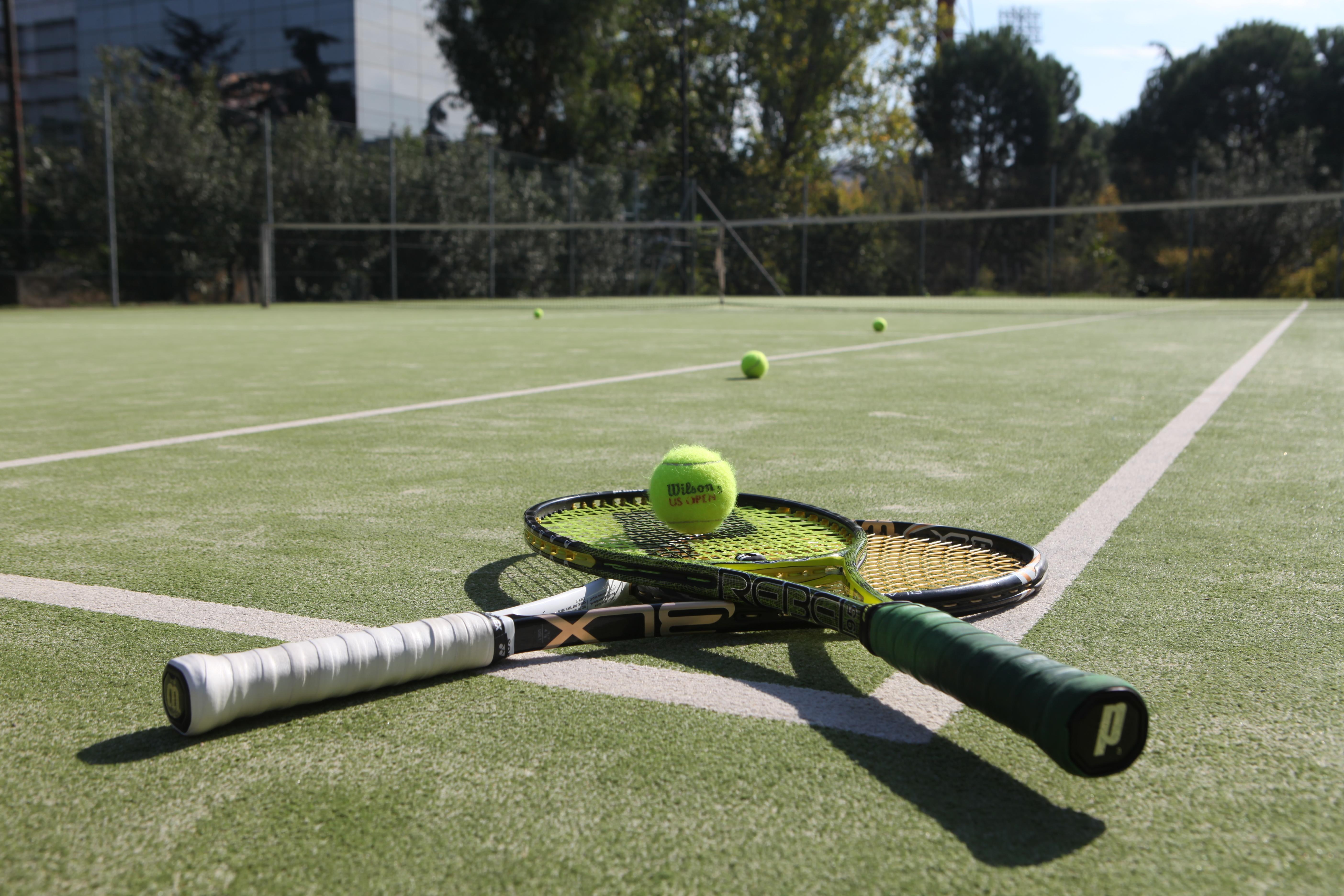 Rogner Hotel Tirana Exterior photo Tennis balls and racket