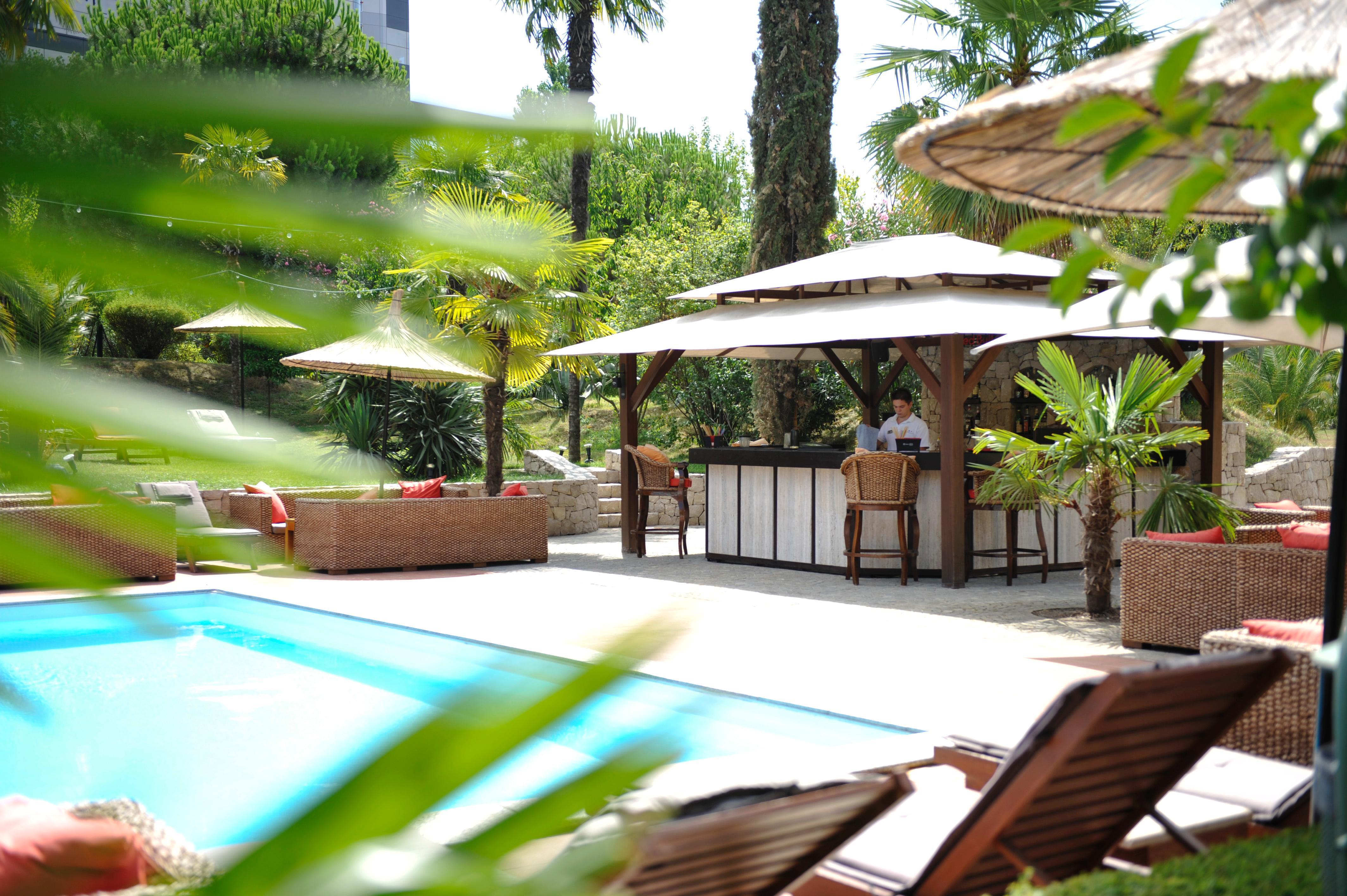 Rogner Hotel Tirana Exterior photo The pool at the hotel